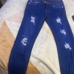 Women's Distressed Blue Jeans